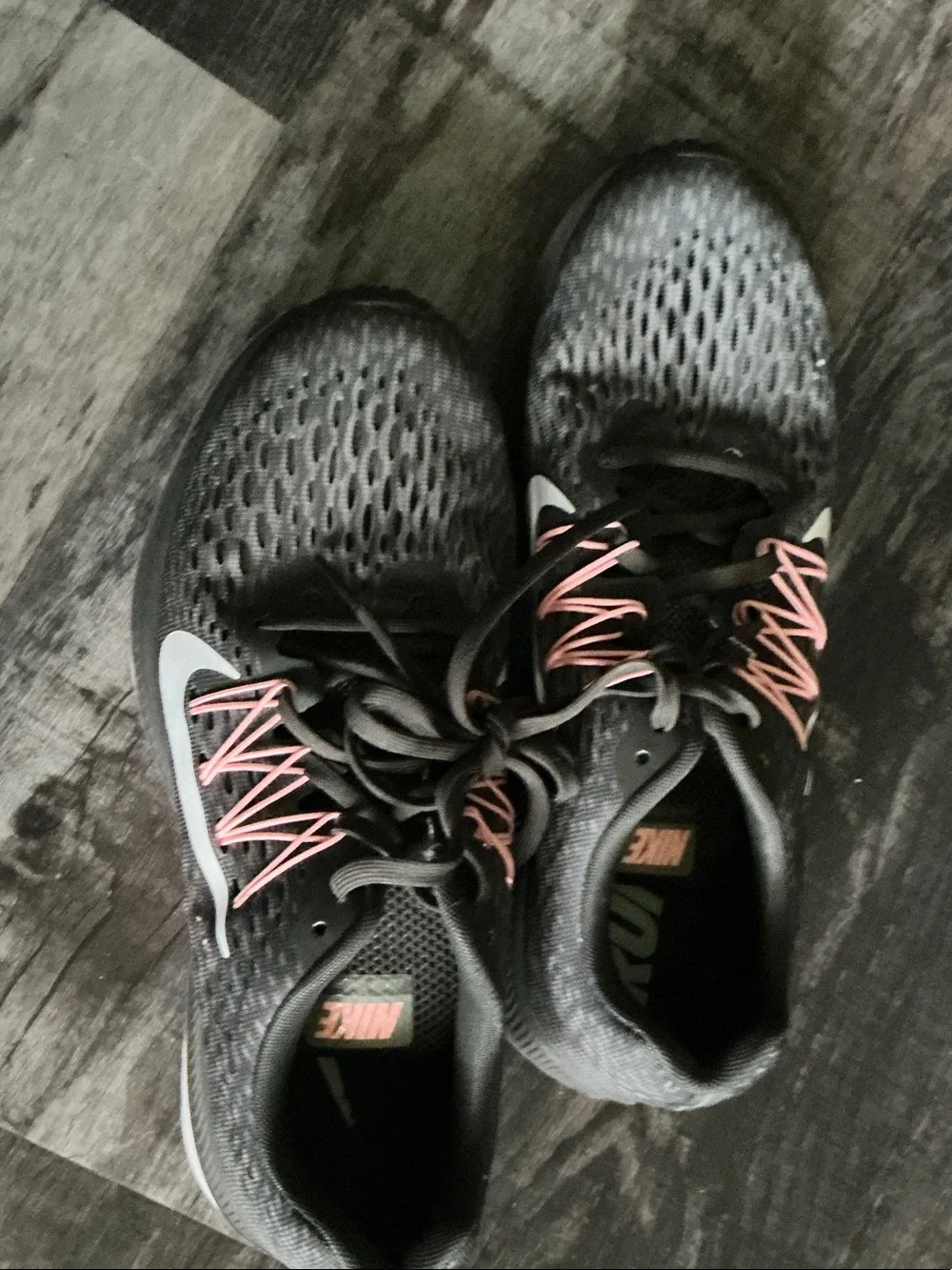Nike Women’s Black Athletic Shoes with Pink Lace Details